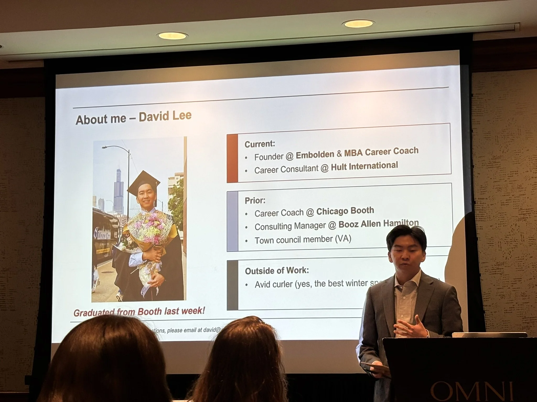 Presentation slide titled 'About me – David Lee' featuring a photo of a man in graduation gown holding a bouquet of flowers, and a list detailing his current and prior roles, as well as personal interests.