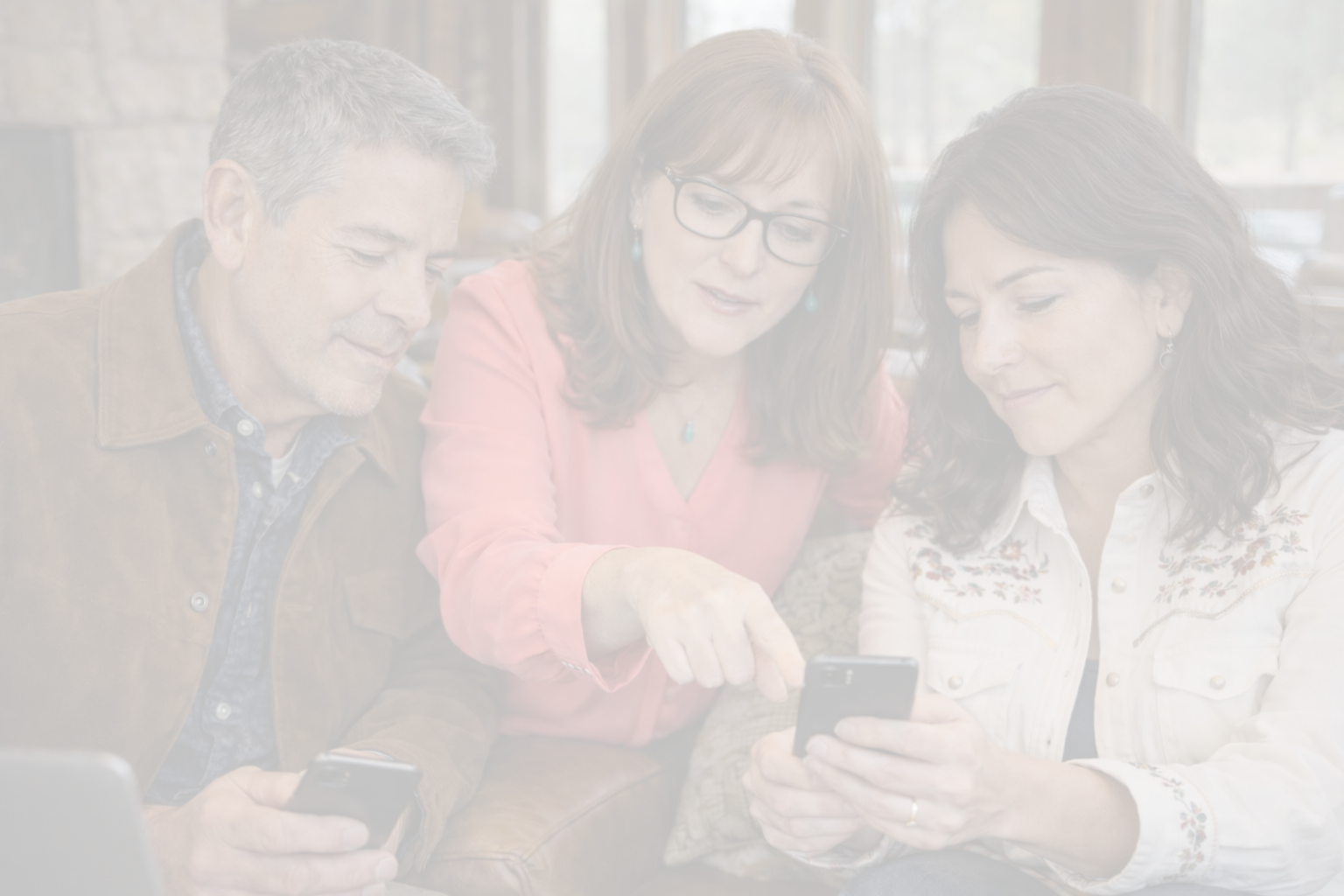 Consultant and clients reviewing phone configuration