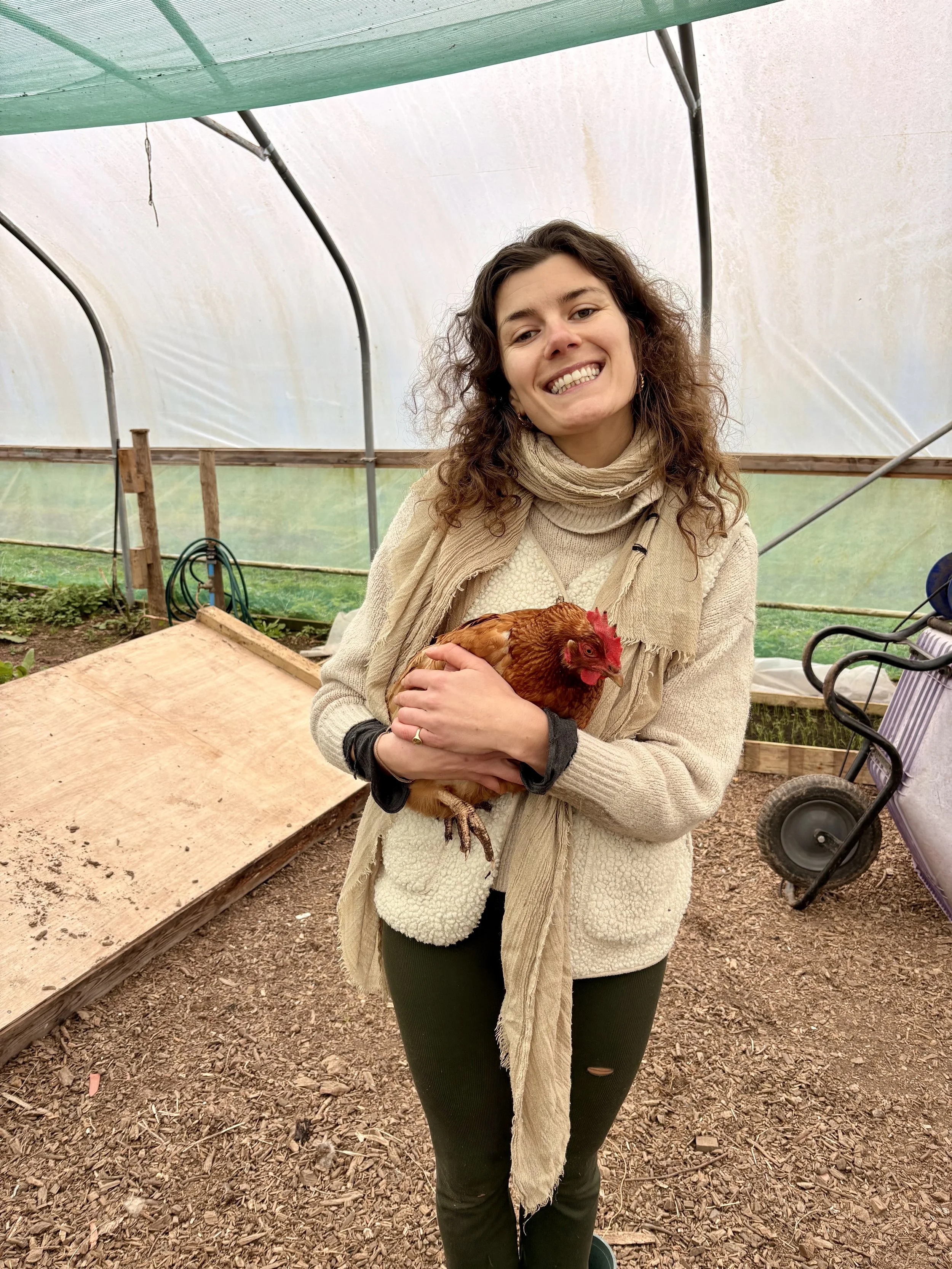 Woman holding chicken