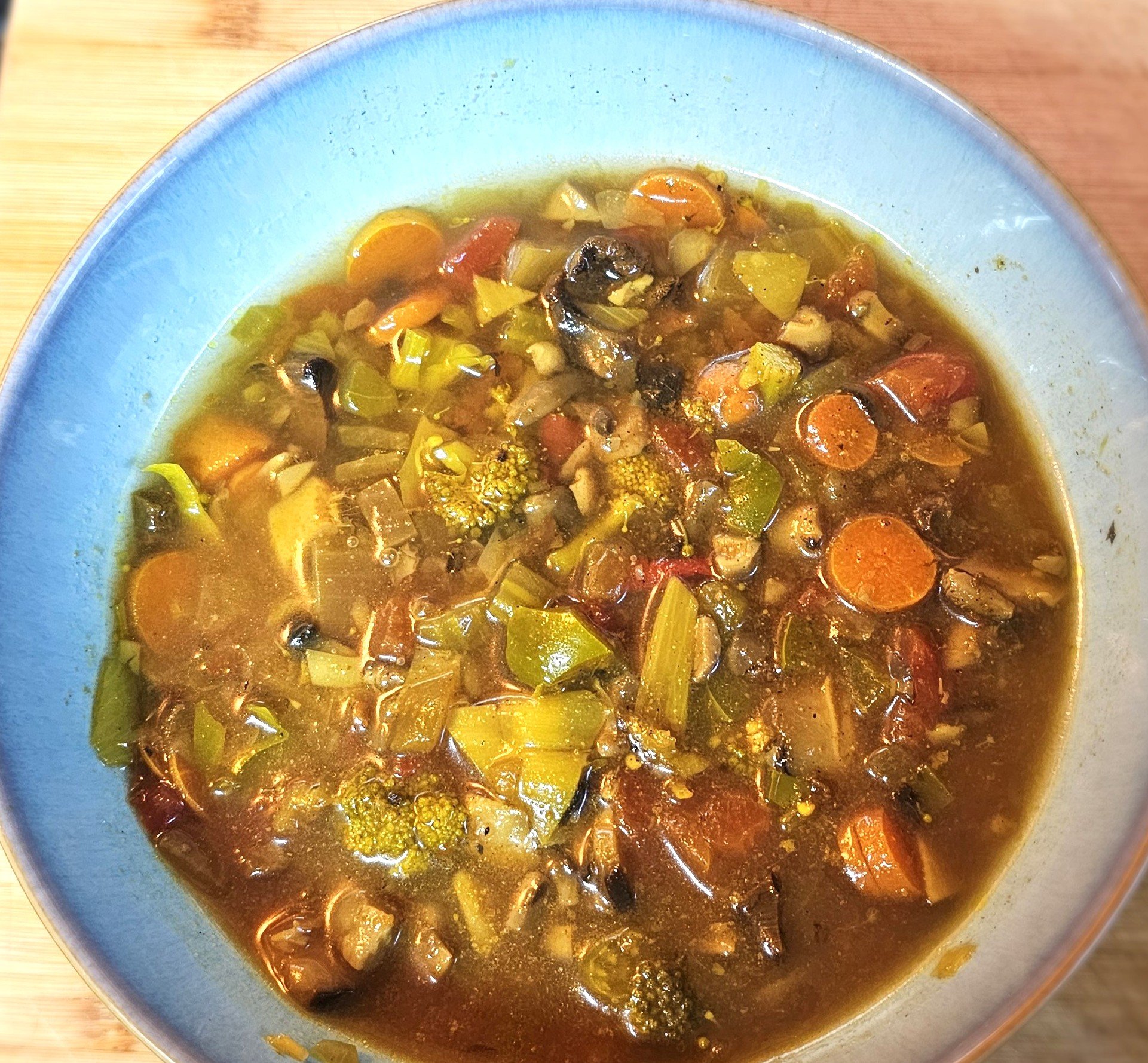 Immune-boosting mushroom soup with vegetables and herbs