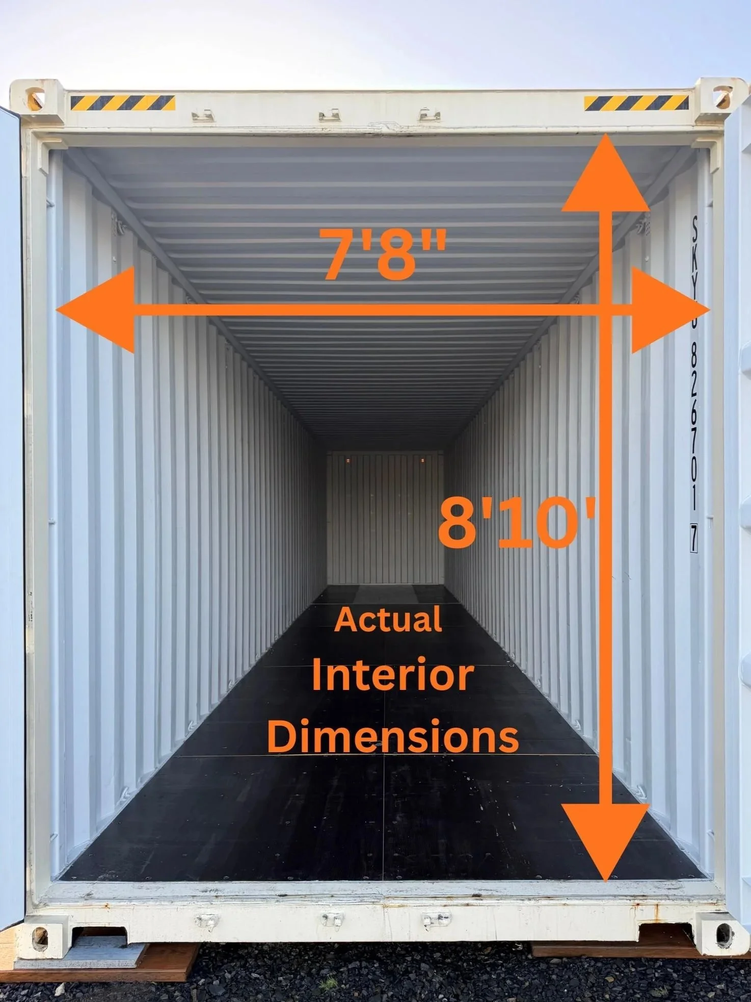 Inside a shipping container showing actual interior dimensions of 7 feet 8 inches wide and 8 feet 10 inches high, with orange labels indicating measurements.