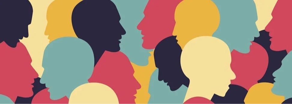 Illustration of multiple overlapping human profiles in various colors including black, yellow, teal, pink, and red, facing each other.