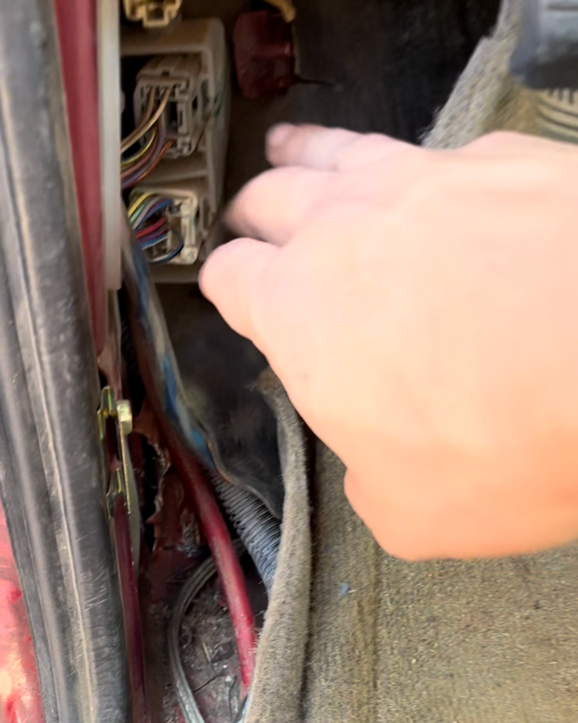 Toyota Tundra interior kick panel area exposed after wheel well damage