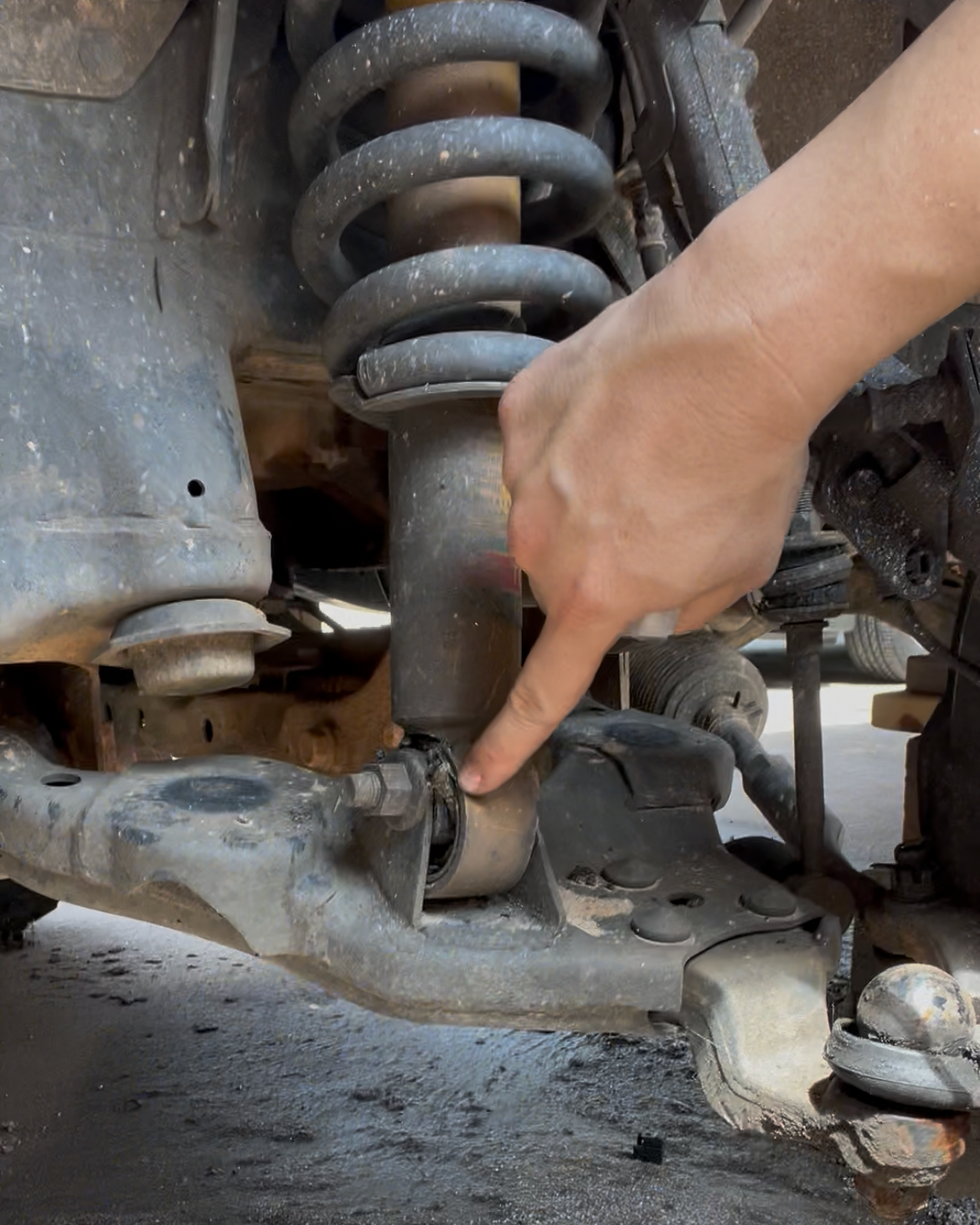 Toyota Tundra front suspension showing worn components during inspection