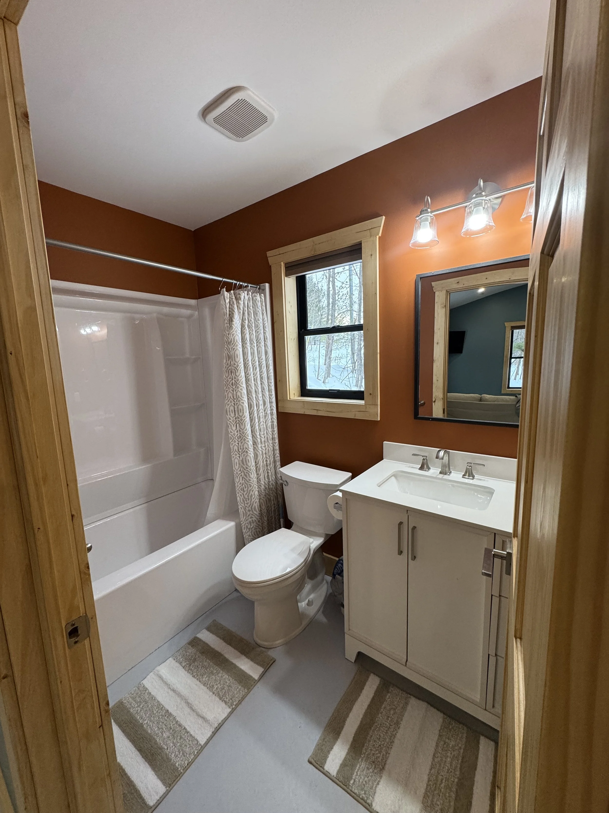 Bathroom stocked with basic toiletry items. 