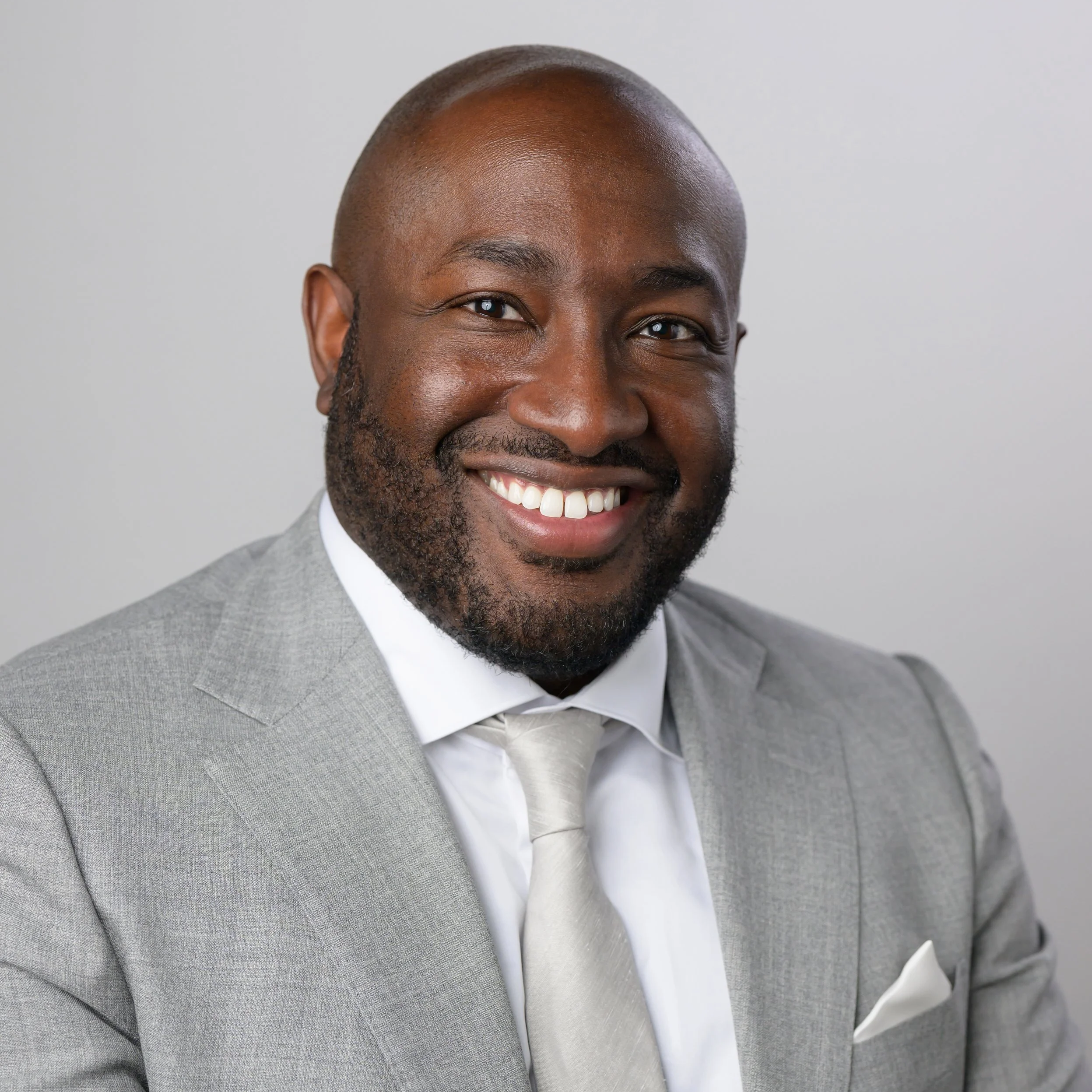 Professional headshot of a licensed social worker and consultant offering compassionate, client-centered services.