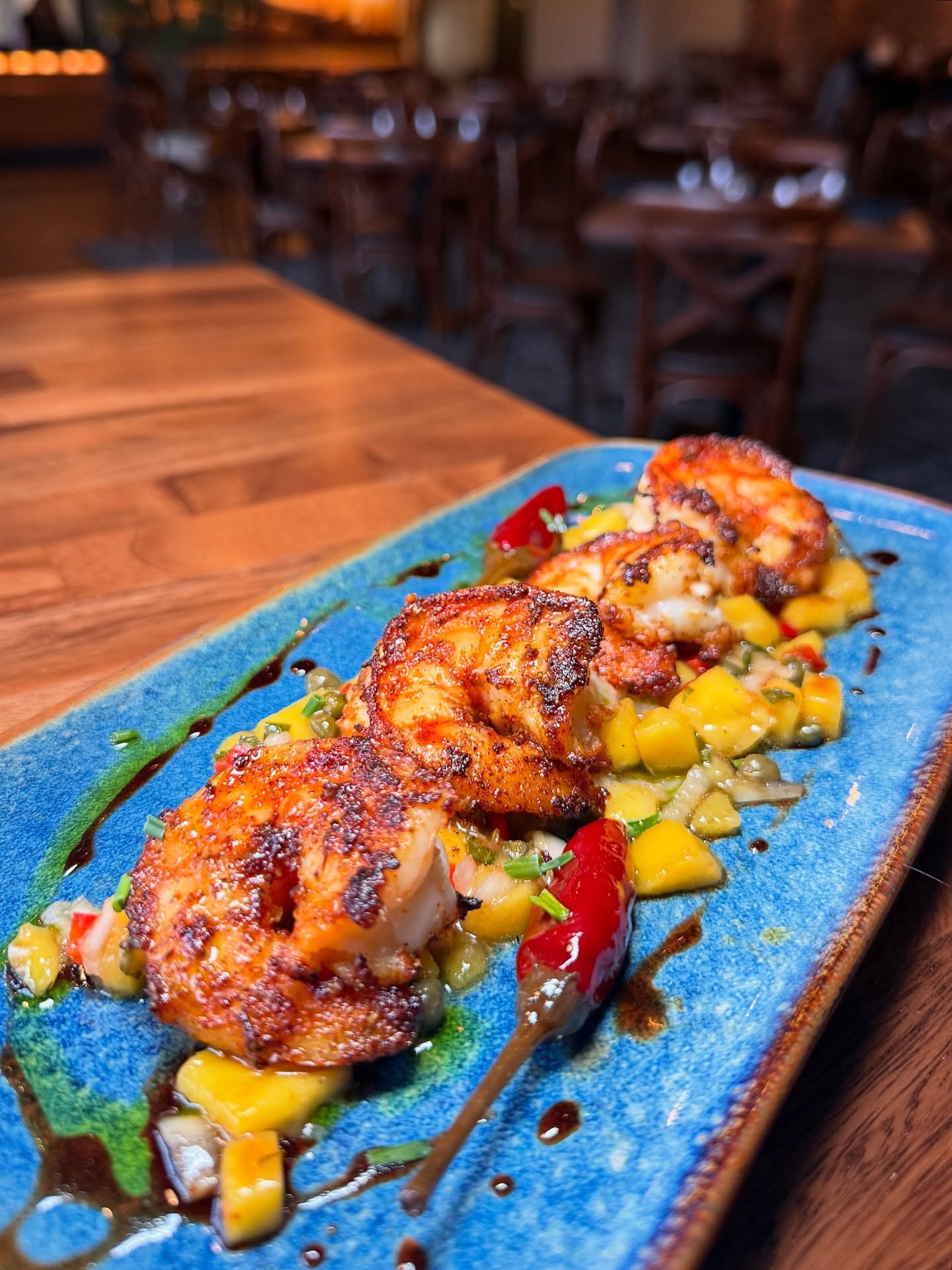New Special! 🍤✨ Seared jumbo shrimp over a fresh homemade mango salsa!