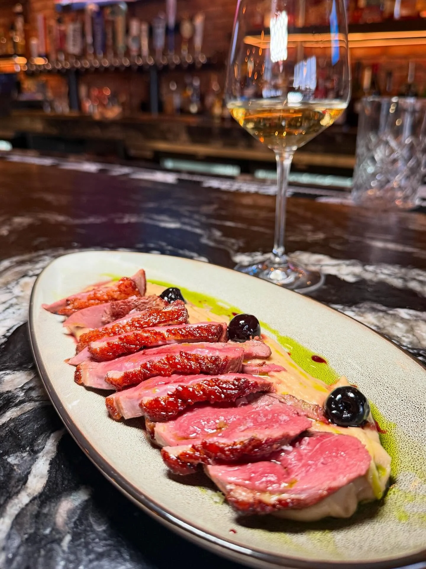 Our beautiful mallard duck special served over creamy potatoes &amp; garnished with juicy black cherries!🦆🍒