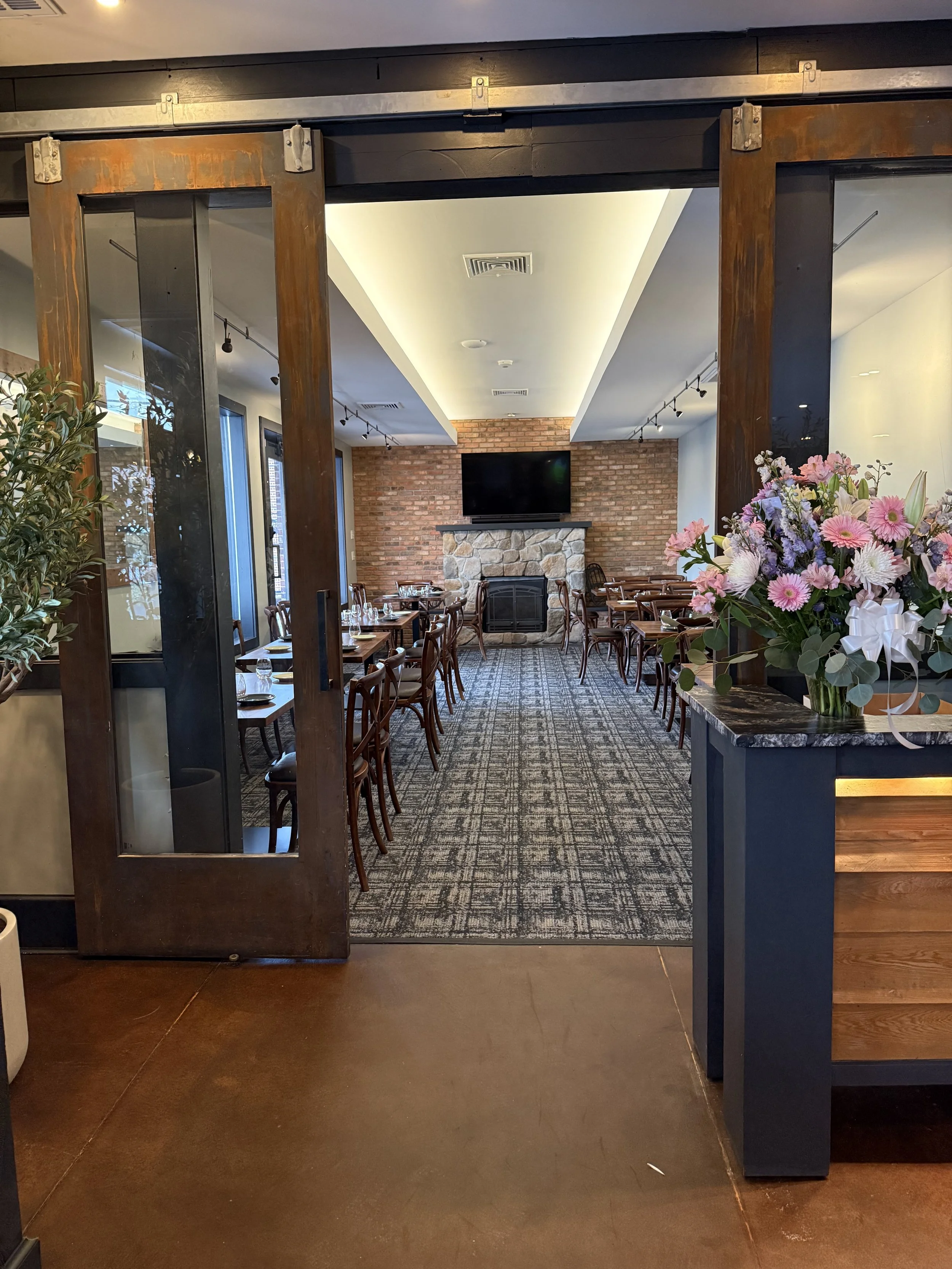 Our fireplace dining room is perfect for small private events