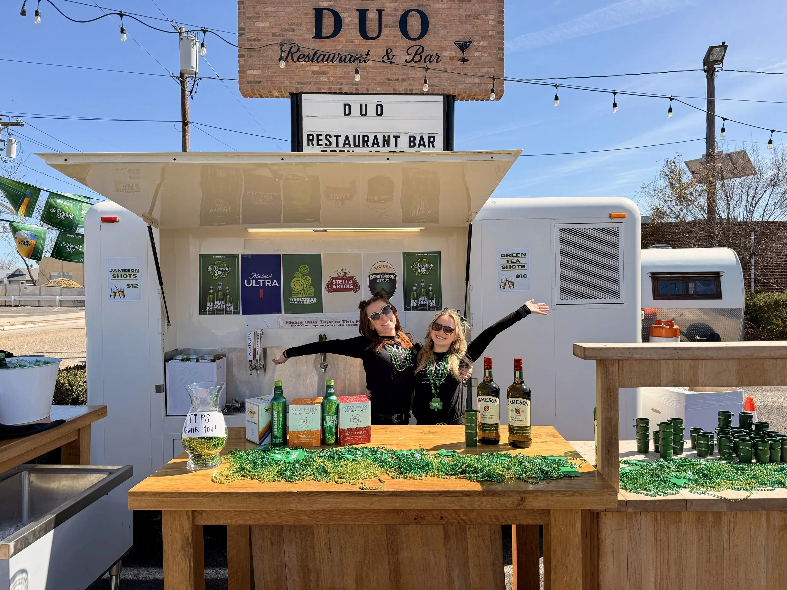 Amanda and Mia getting ready to greet our St. Patty's Day guests in our beer garden party zone