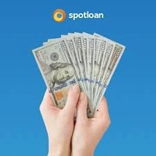 Hand holding multiple $100 bills in front of a blue background with Spotloan logo.