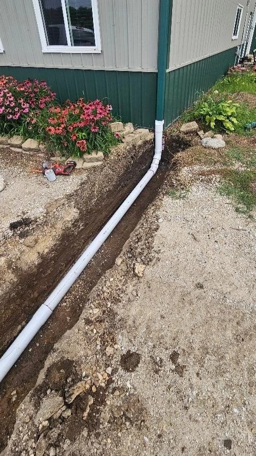 Underground gutter drainage. pvc pipe drainage. excavation in Kewanee. excavation in Galva