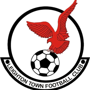 Leighton Town Football Club logo featuring a red eagle with outstretched wings perched on a soccer ball.
