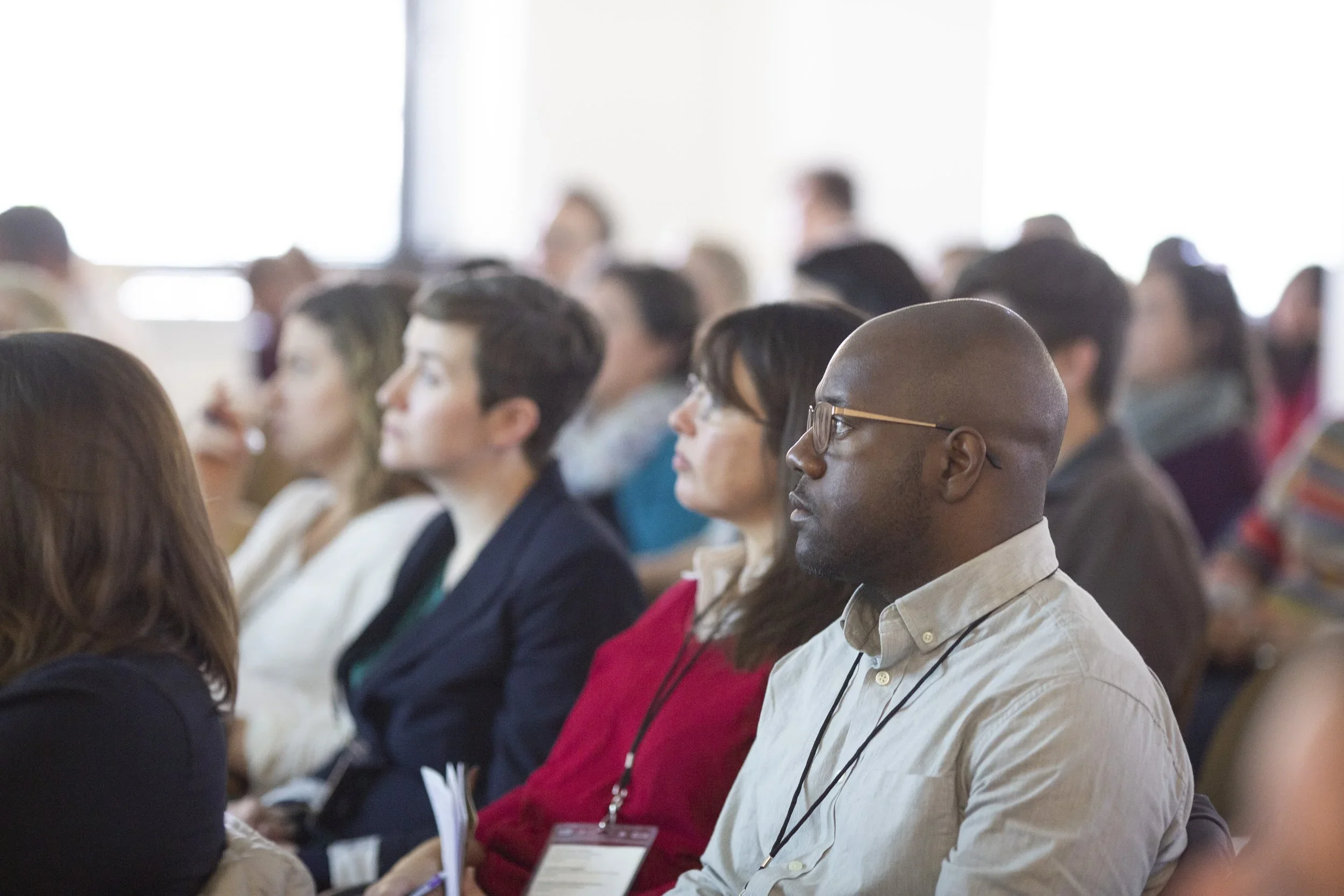 Wildlife biologist and ecologists listening to the lastest research at a summit