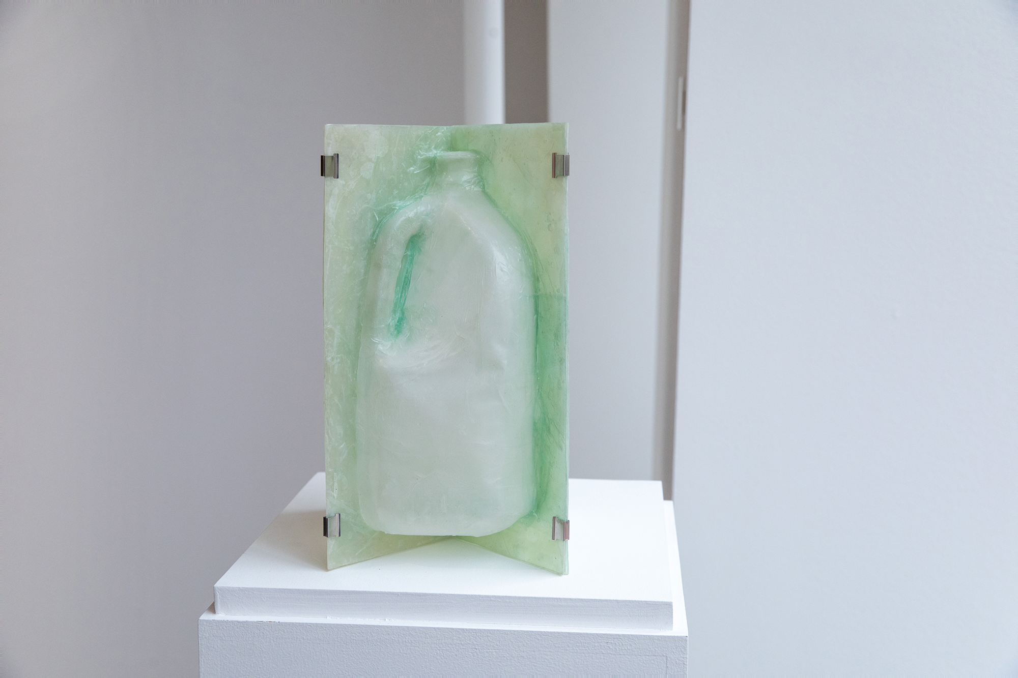 vessel, 2024. gallon of water, collagen, 9" x 9" x 12". Installed in "West Follies," solo exhibition in Fort Worth, TX