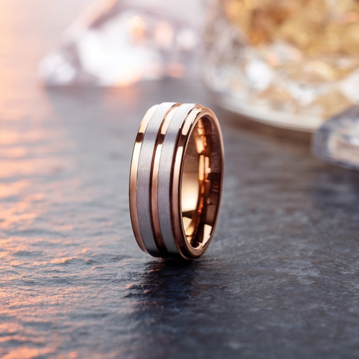 Beautiful men's wedding band in rose gold with three channels and both matte and polished finishes.
