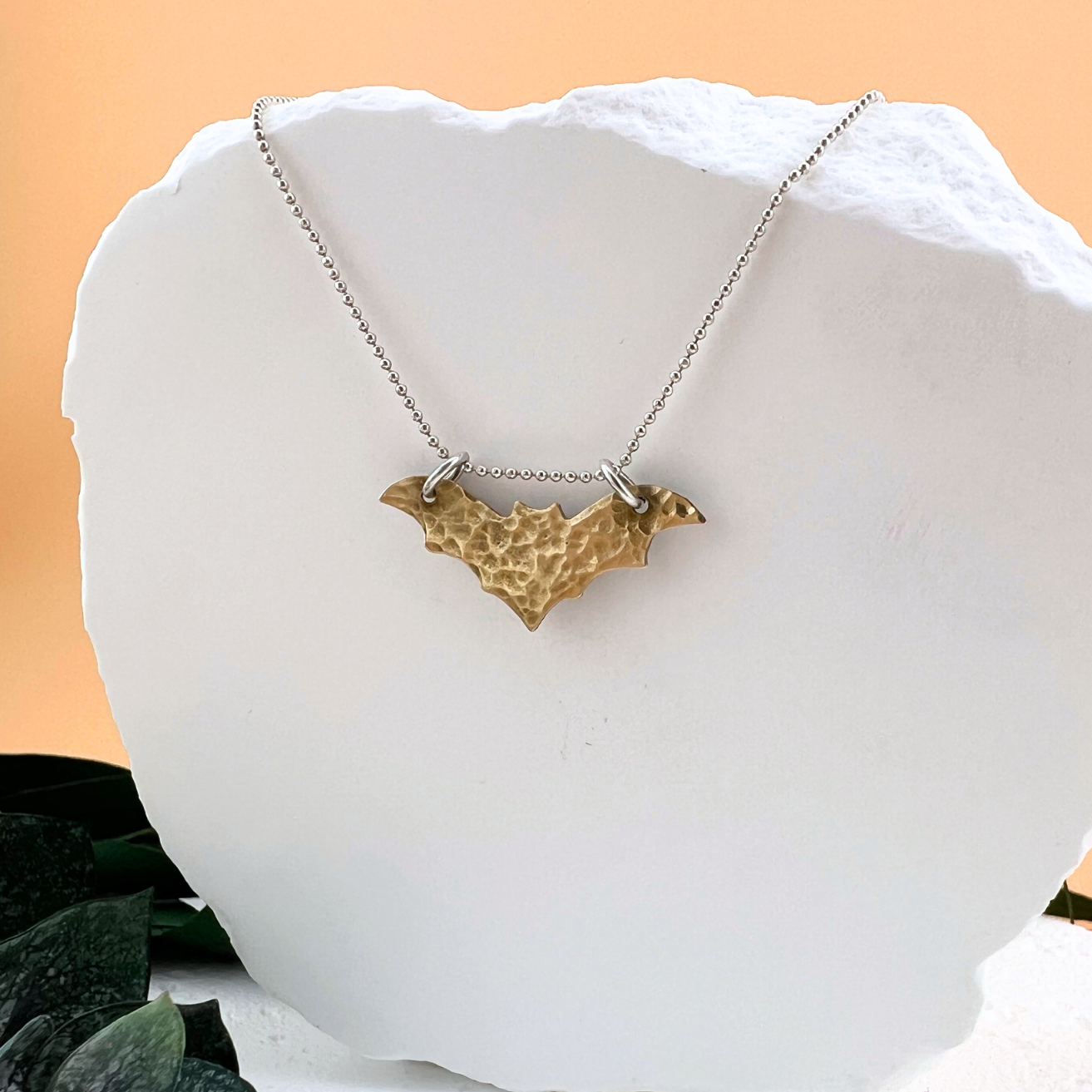 Brass bat nocturne style pendant necklace on sterling silver chain