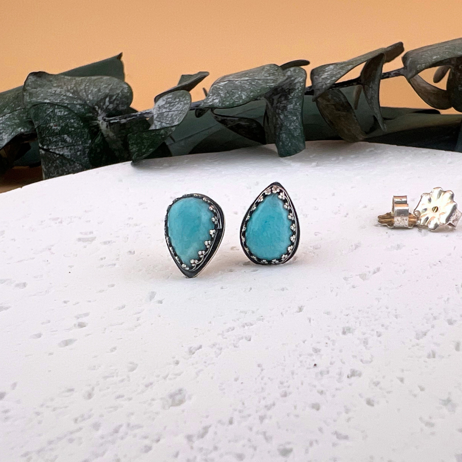 Tiny sterling teardrop-shaped amazonite silver stud earrings.