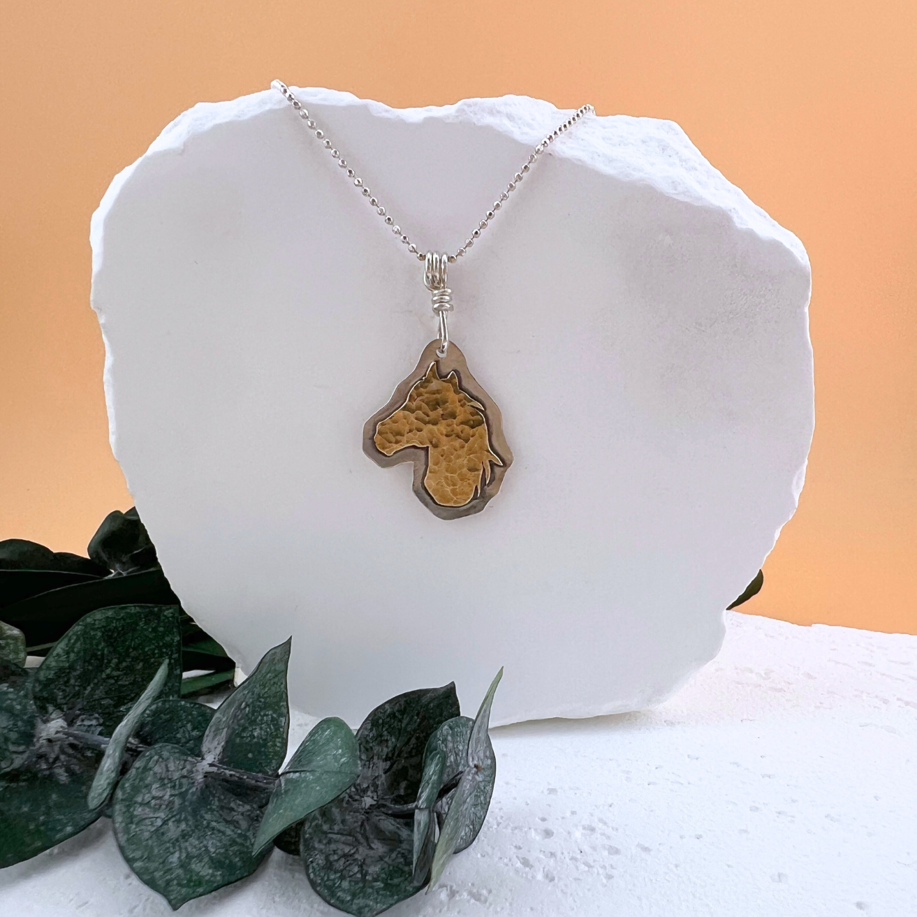 Heritage Horse Head necklace in brass and sterling silver.