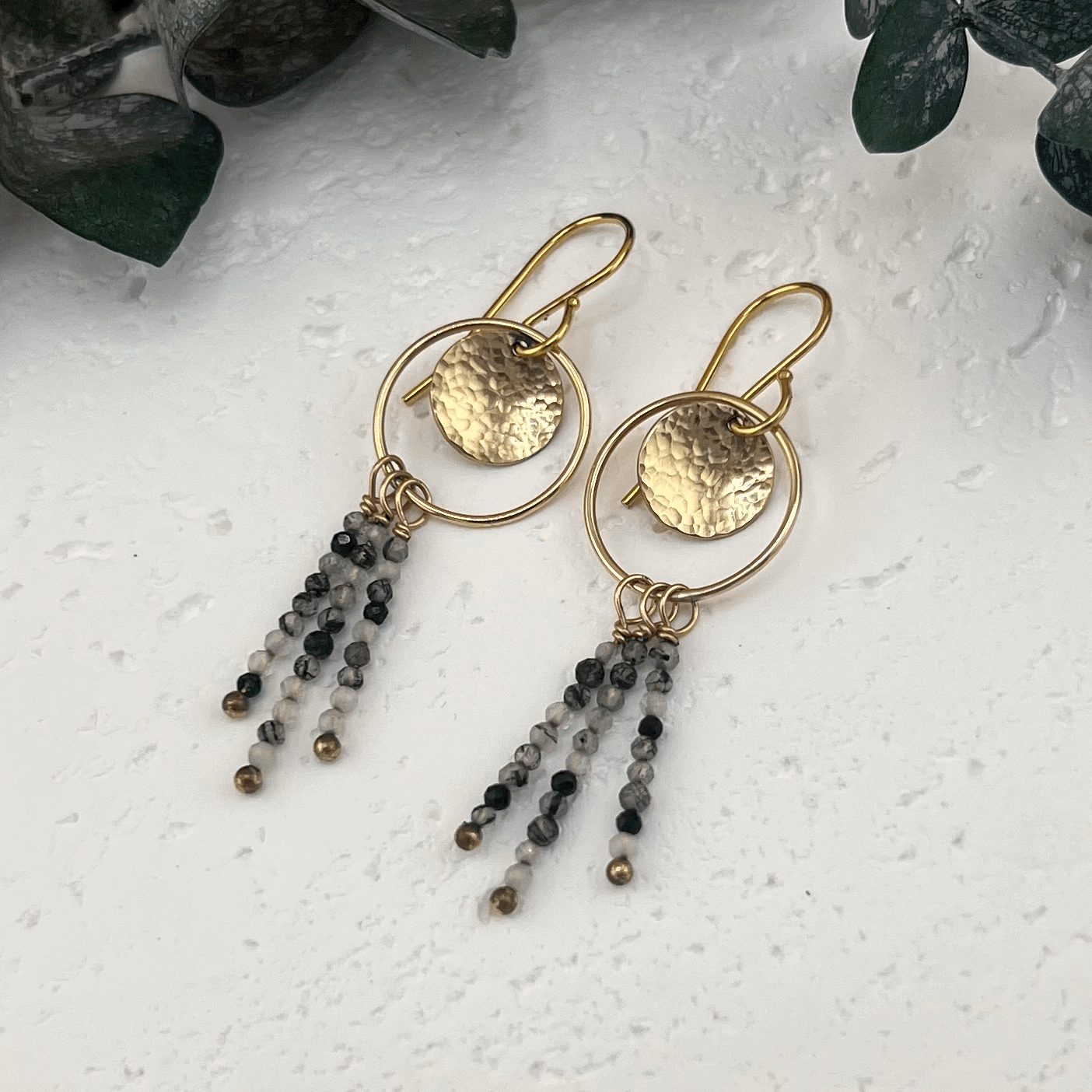 Handcrafted 14kt gold fill earrings with hammered disc details and cascading rutilated quartz gemstone beaded fringe.