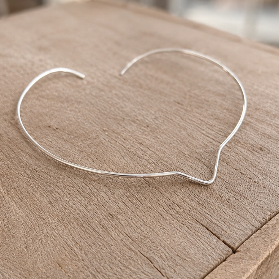 Hand-forged sterling silver Horizon Collar statement necklace by Alison Marie Artisan Jewelry, lightweight 17-inch sculptural collar with a modern minimalist design.