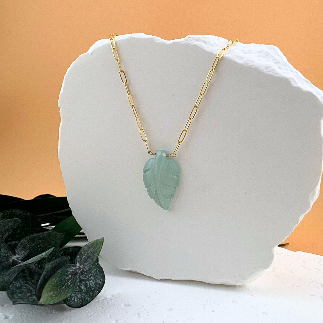 Aqua chalcedony leaf pendant necklace on 14kt gold fill paperclip chain.