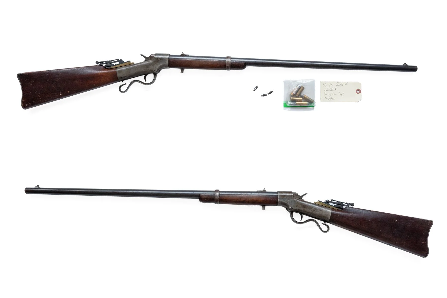 22 - 46 Ballard, Made by Brown Manufacturing Co, Newburyport, Mass., Nov 5, 1881 - has duel ignition, a gunsmith made a firing pin that interchanges with the percussion cap nipple therefore you can use Colt 45 center cartridges