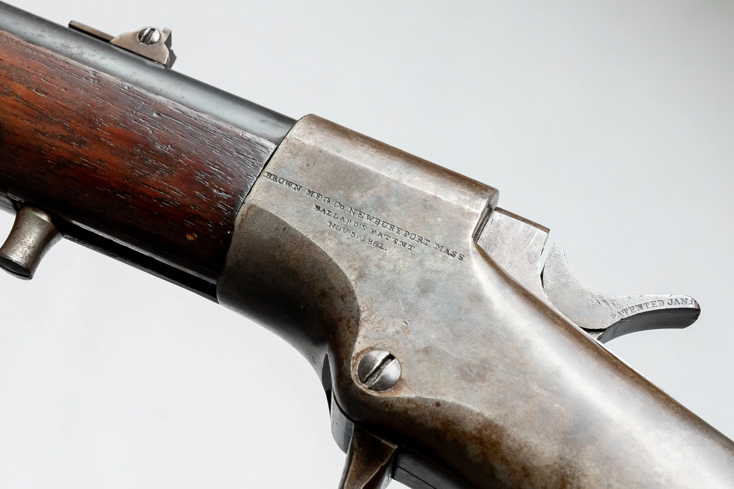22 - 46 Ballard, Made by Brown Manufacturing Co, Newburyport, Mass., Nov 5, 1881 - has duel ignition, a gunsmith made a firing pin that interchanges with the percussion cap nipple therefore you can use Colt 45 center cartridges