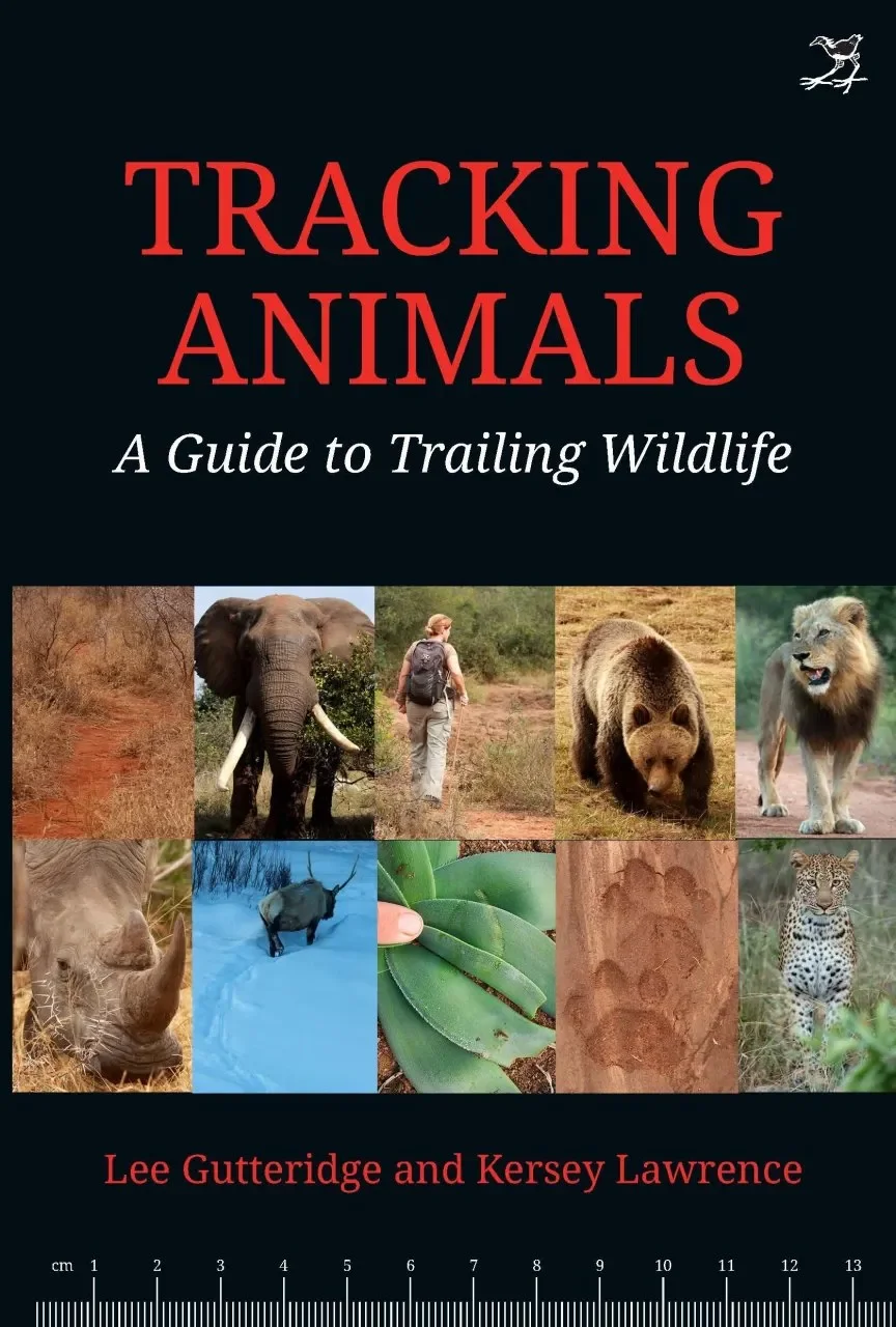 Book cover titled "Tracking Animals: A Guide to Trailing Wildlife" by Lee Gutteridge and Kersey Lawrence. The cover features a series of images of wildlife and tracks, including an elephant, a person walking, a bear, a lion, a rhinoceros, a jaguar, and animal tracks, arranged in a grid.