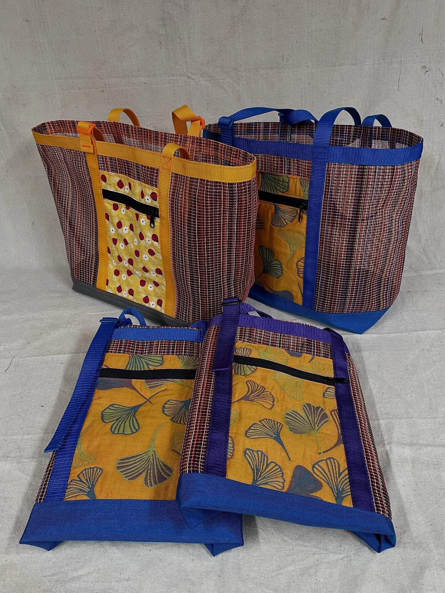 Just wrapped up a batch of Boat (Beach??) Totes. I made some design changes and new features to this batch: the bottom of front pocket is now captured in the bottom panel fabric so it&rsquo;s actually the zipper pocket and the slide in one behind; th