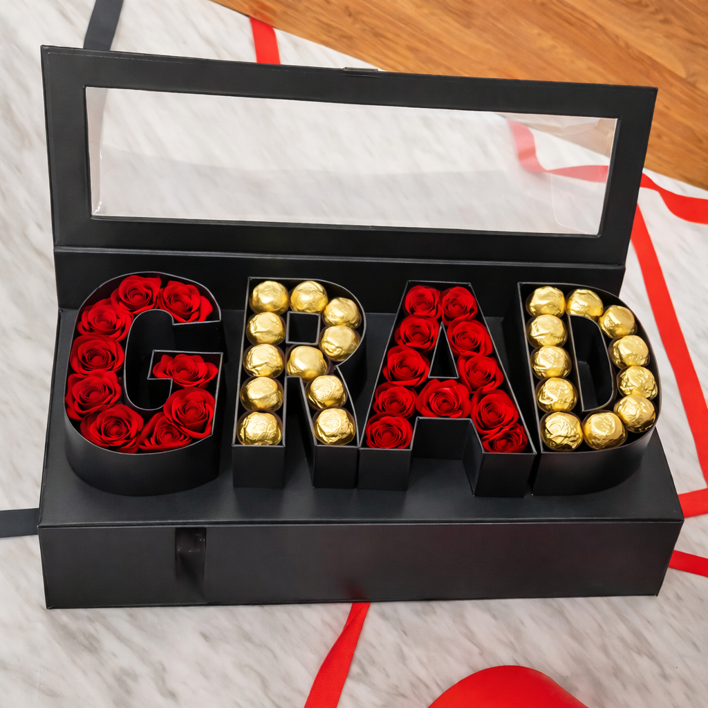 Graduation gift box with roses and chocolates.png