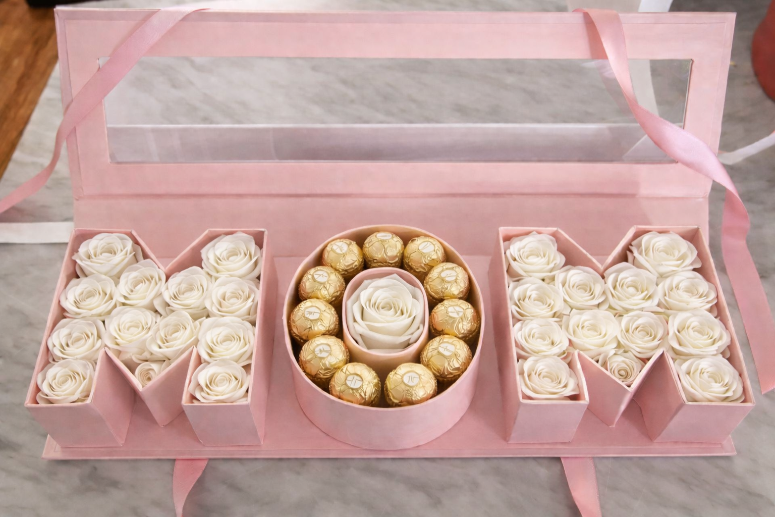 Pink gift box for mom.png