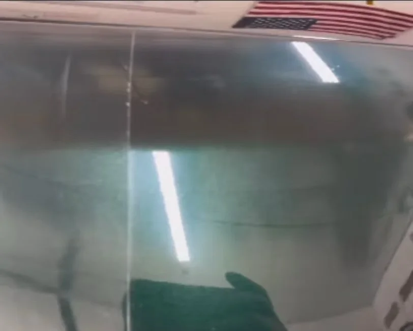 Car hood restoration for a green car