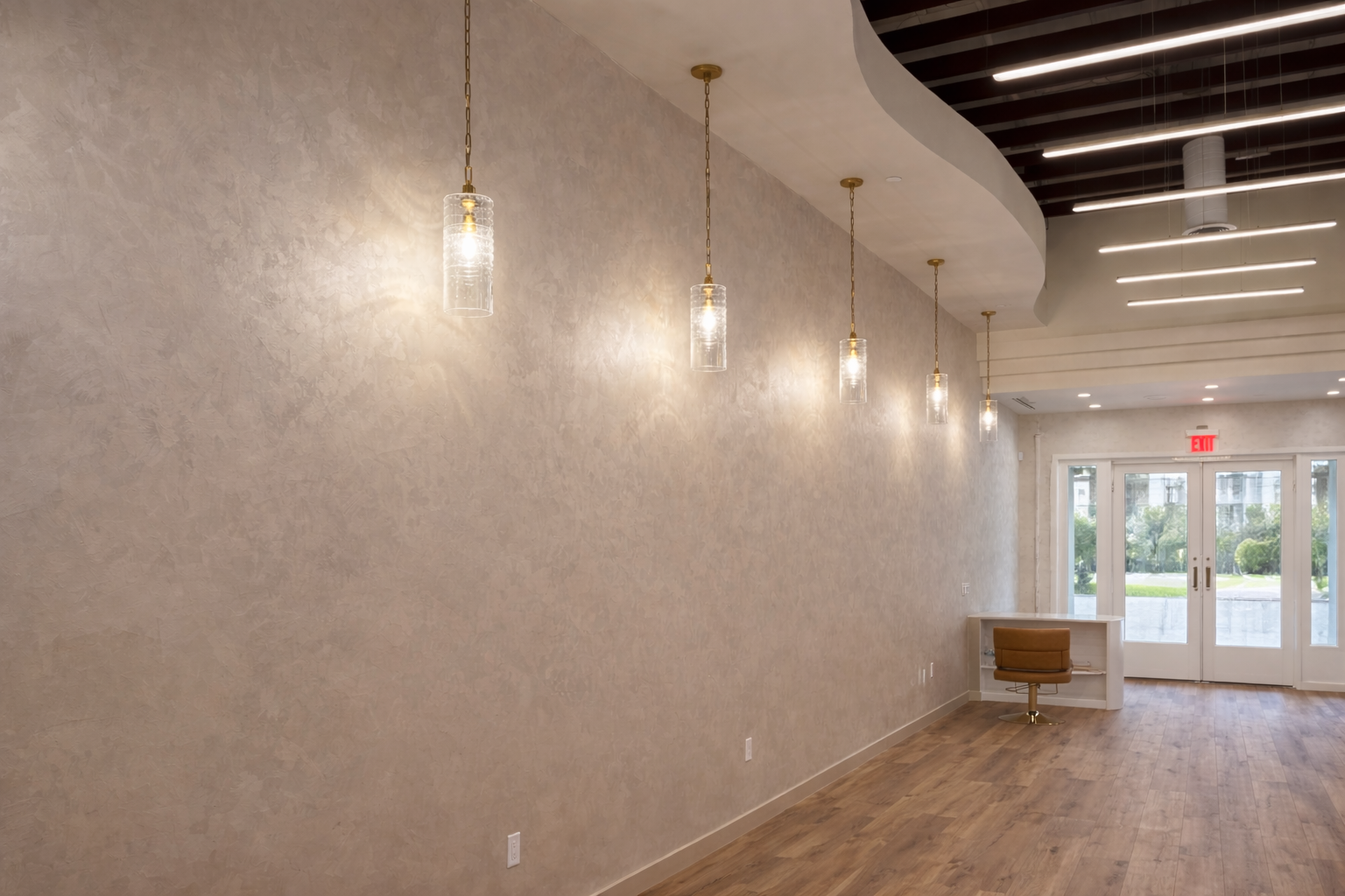 Elegant spa hallway with pendant lights.png