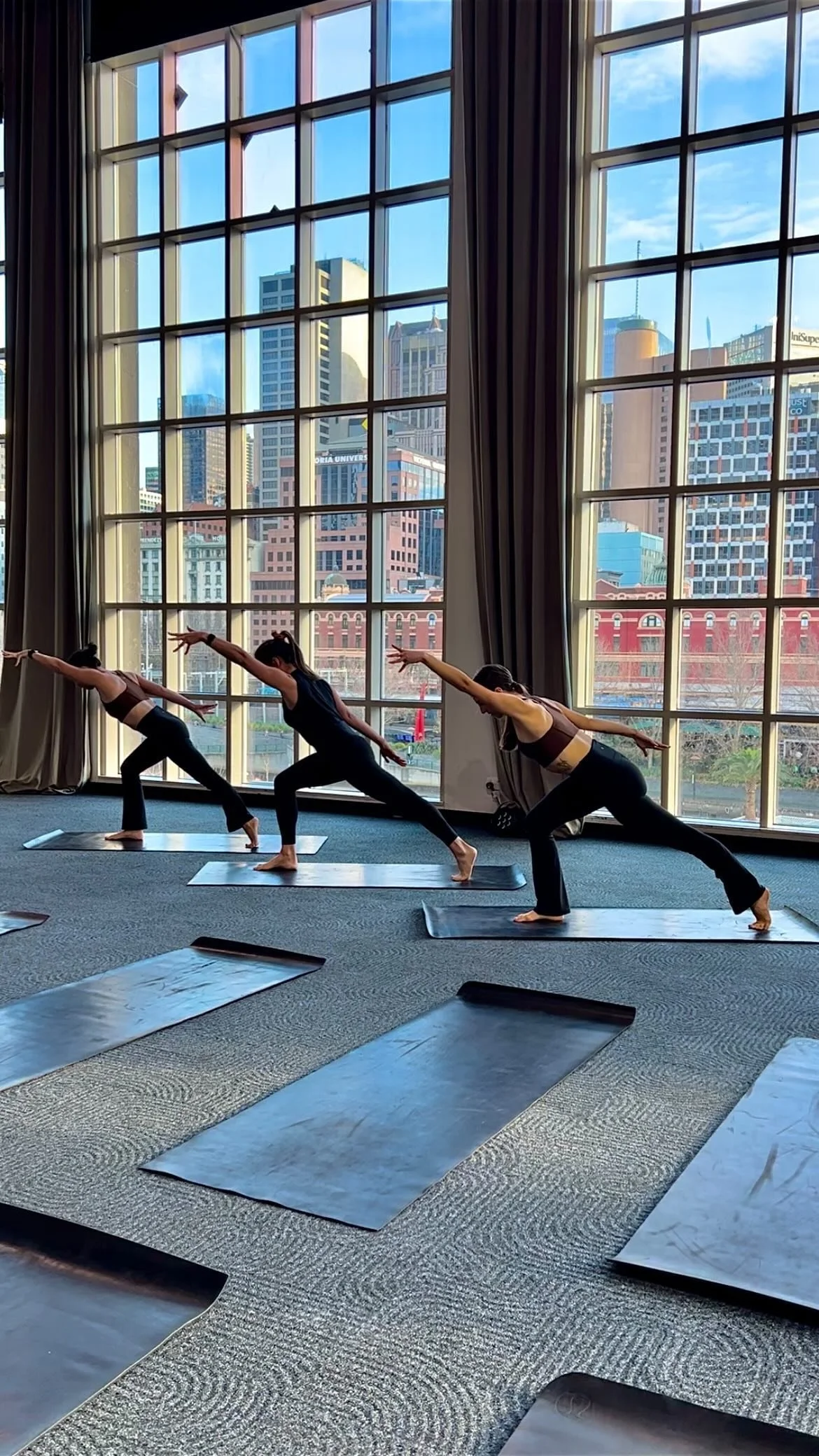 Yoga teachers Ashleigh Dickinson and Jade McKenzie facilitating a 200-hour yoga teacher training in Melbourne cbd. Private Yoga Teacher