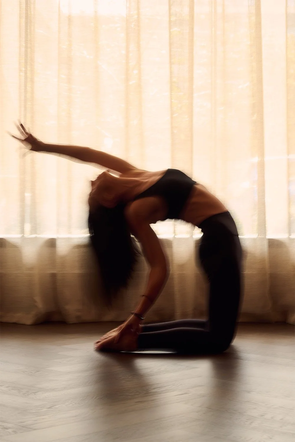 Ashleigh Dickinson, yoga teacher and mentor in Melbourne, practising yoga indoors.
