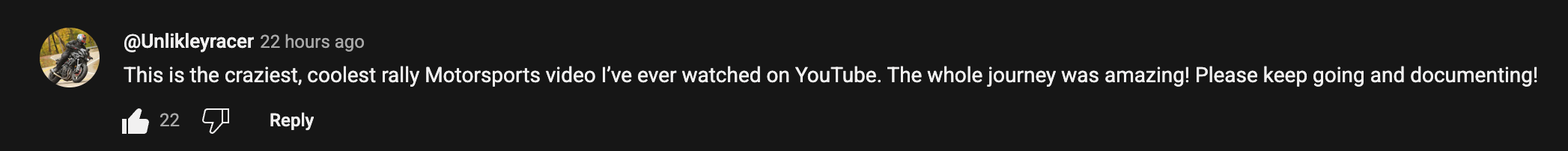 A motorcycle on a racetrack with a rider in racing gear leaning through a turn.