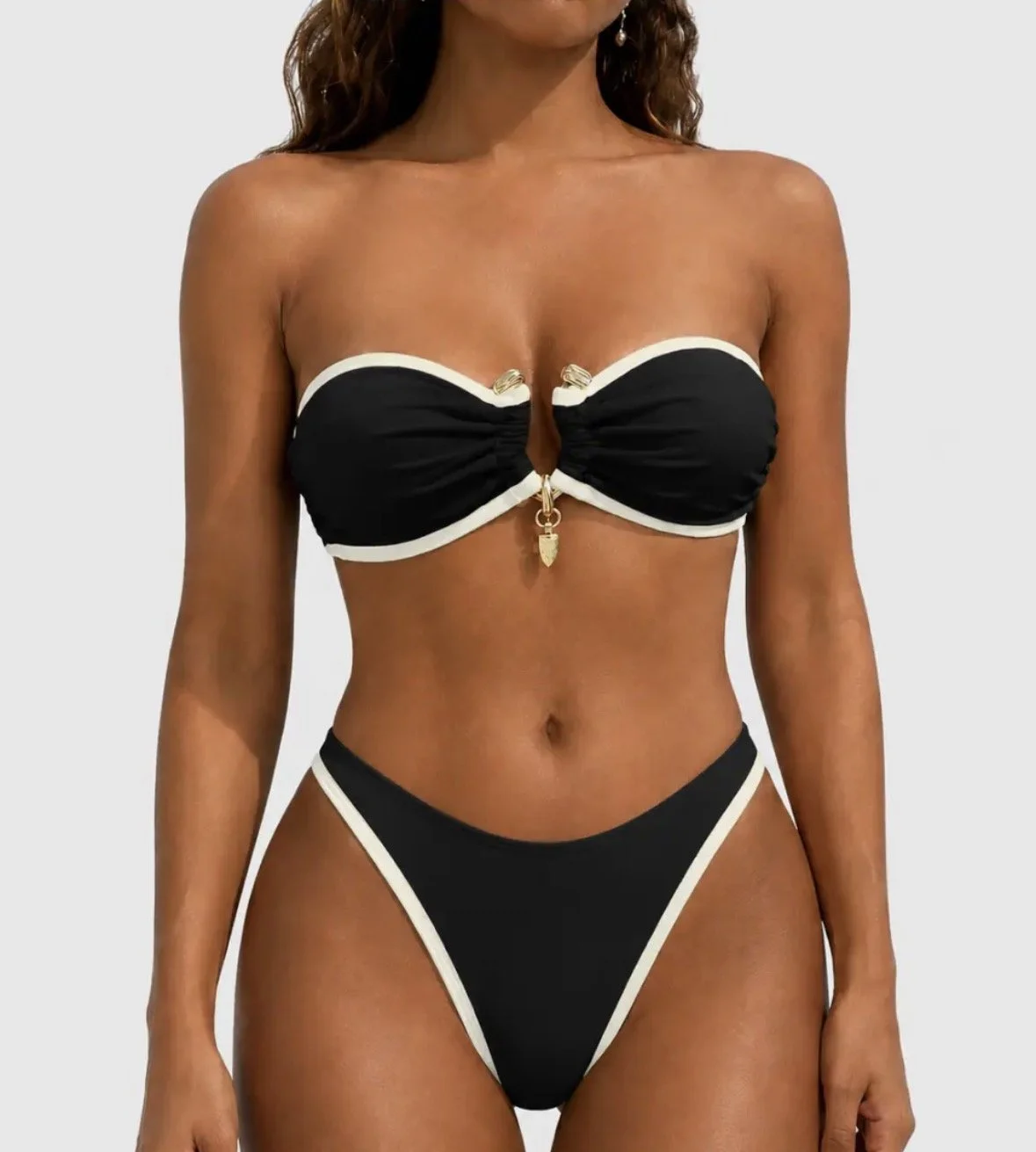 Luxury Black with white trim swim suit with gold detail middle of bust