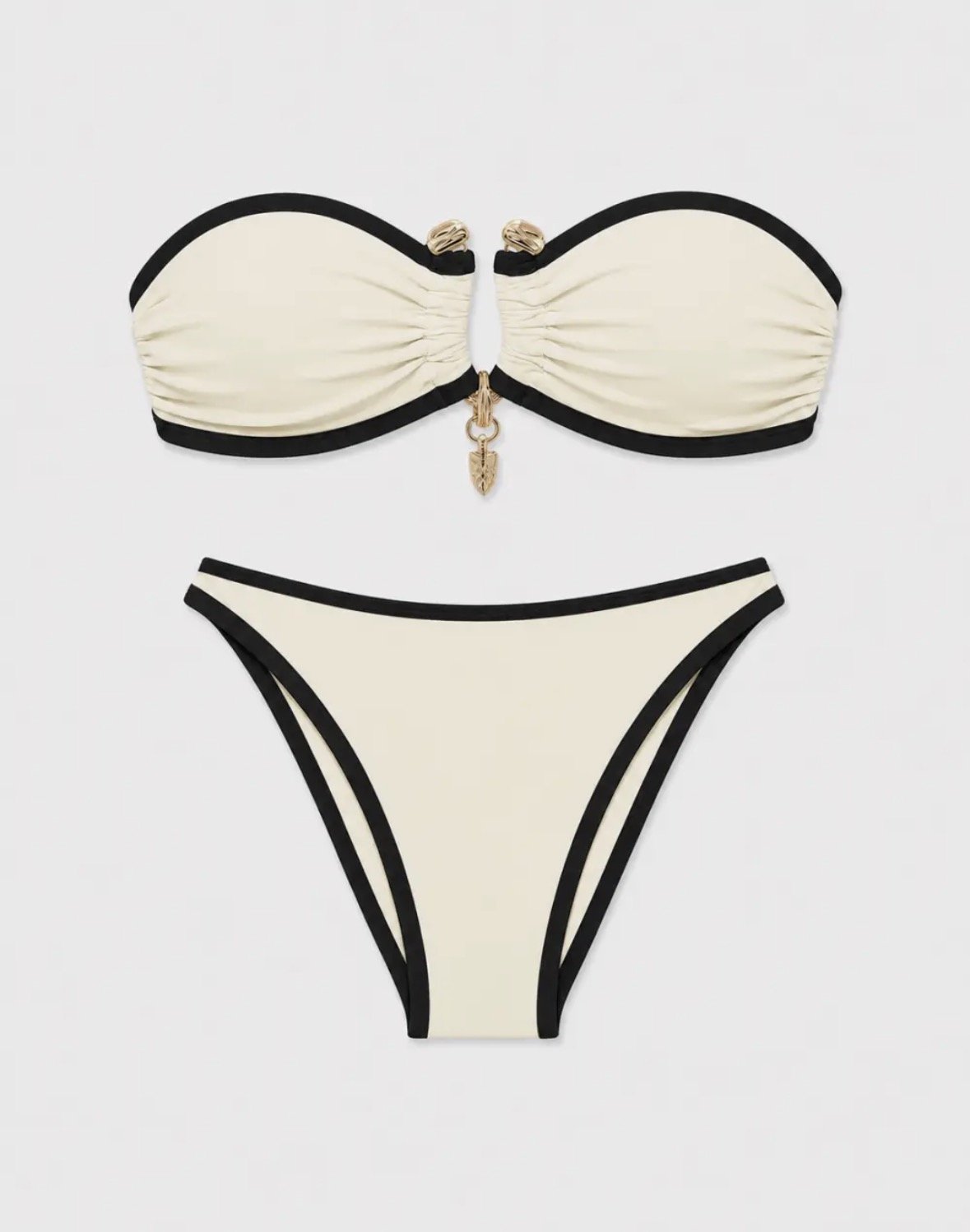 Luxury white with black trim swim suit with gold detail middle of bust