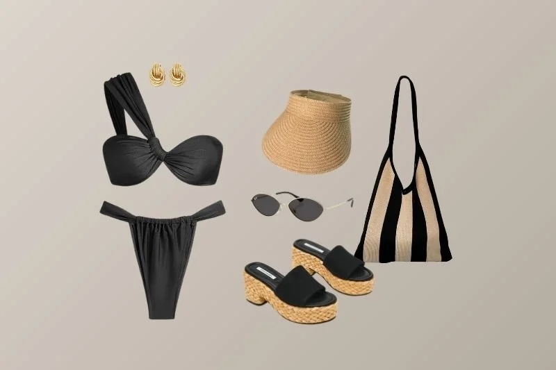 Black bikini with gold earrings, straw clutch, black sunglasses, black and beige striped tote, black platform sandals with woven heels.