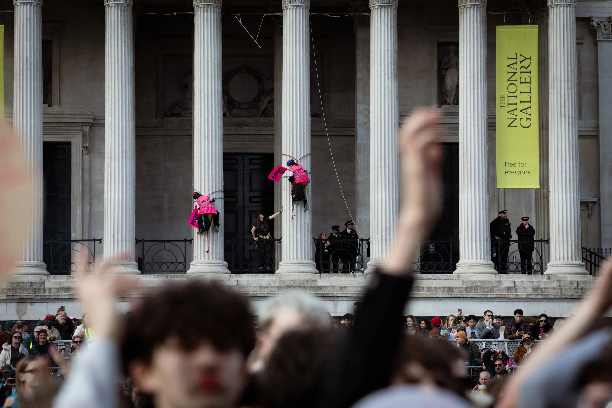 Protesters mounted columns at the National Gallery to try to drop a banner, but failed after police intervened. 