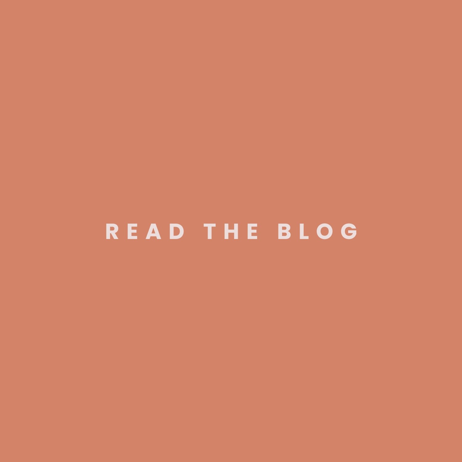 A solid peach-colored background with white text in the center that reads "READ THE BLOG."