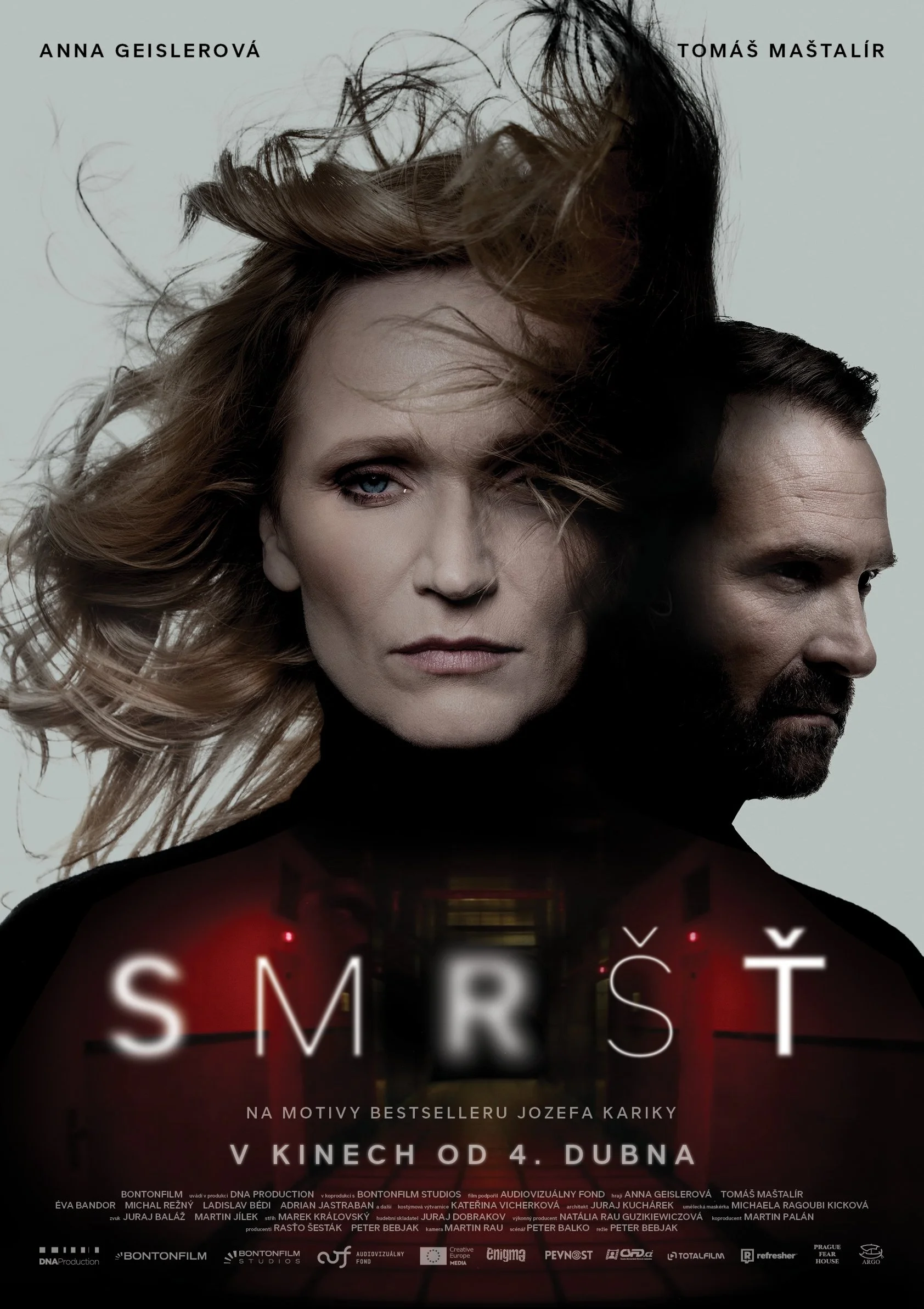 A promotional poster for a film titled 'Smart.' It features a woman with windblown blonde hair and a serious expression, and a man with short dark hair and a beard, both facing sideways with stern looks. The background is plain, and the title is in bold, white, glowing letters at the bottom of the poster.