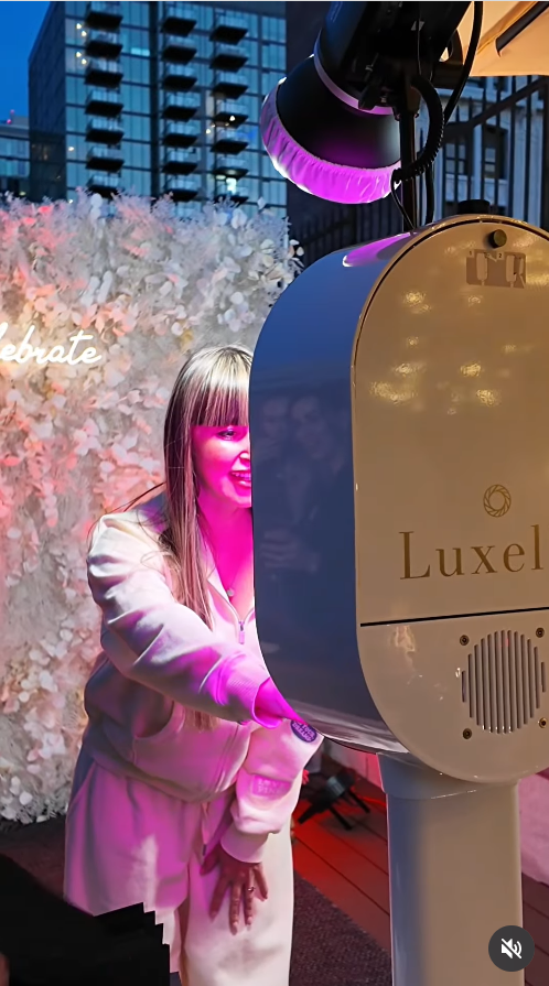 Guests at the Social Clarity Creatives Slumber Bash at Kollab LA in a Luxelle photo booth capture with The Cloud Nine backdrop