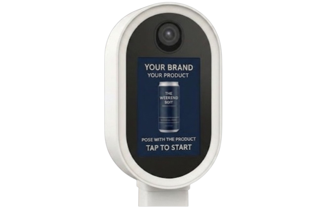 Illustrative Luxelle tap-to-start capture screen with a featured product placed in the branded prompt