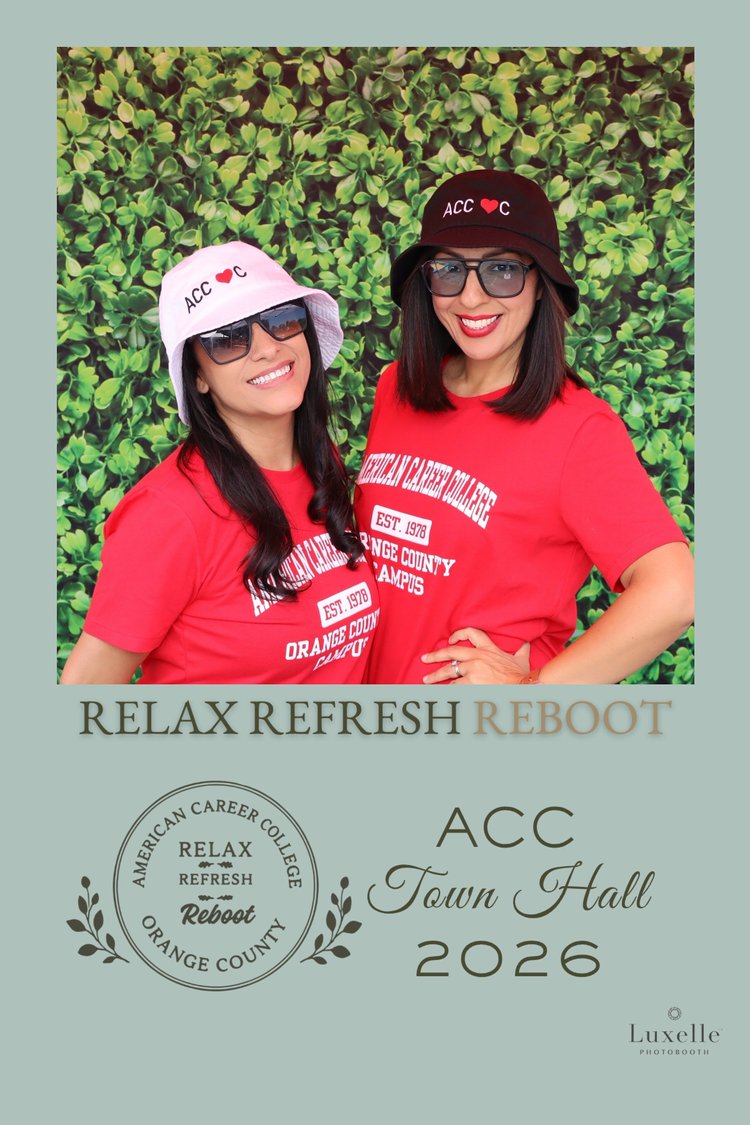 Two women in American Career College branded apparel posing in front of a green backdrop in a custom event photo template