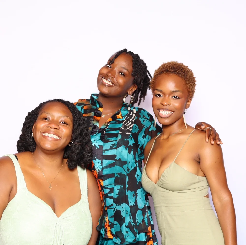 Graduates in a Luxelle booth portrait at a UCLA campus celebration