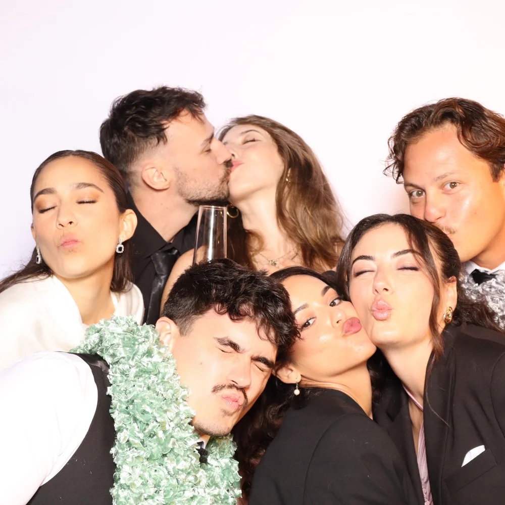 A group of wedding guests in a Luxelle booth portrait at a Saddlerock Ranch reception