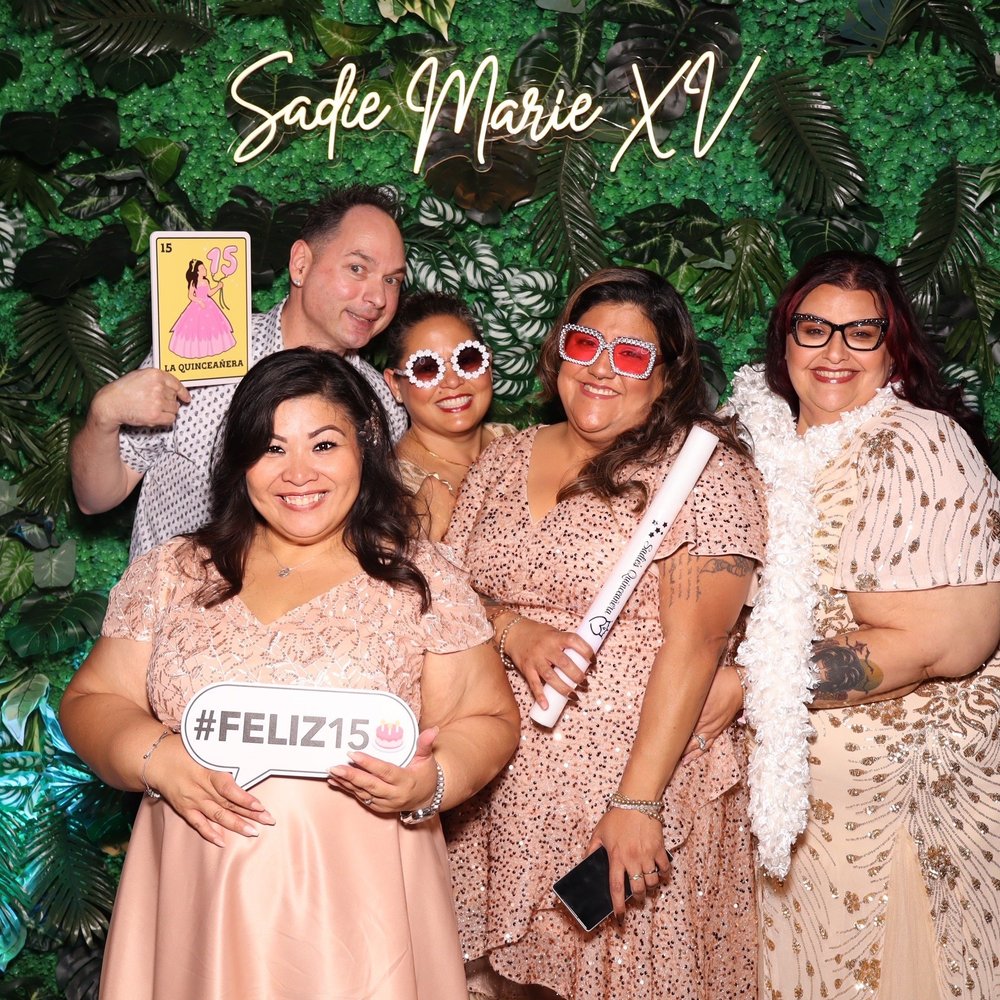 A studio-lit Luxelle booth portrait from a quinceañera reception