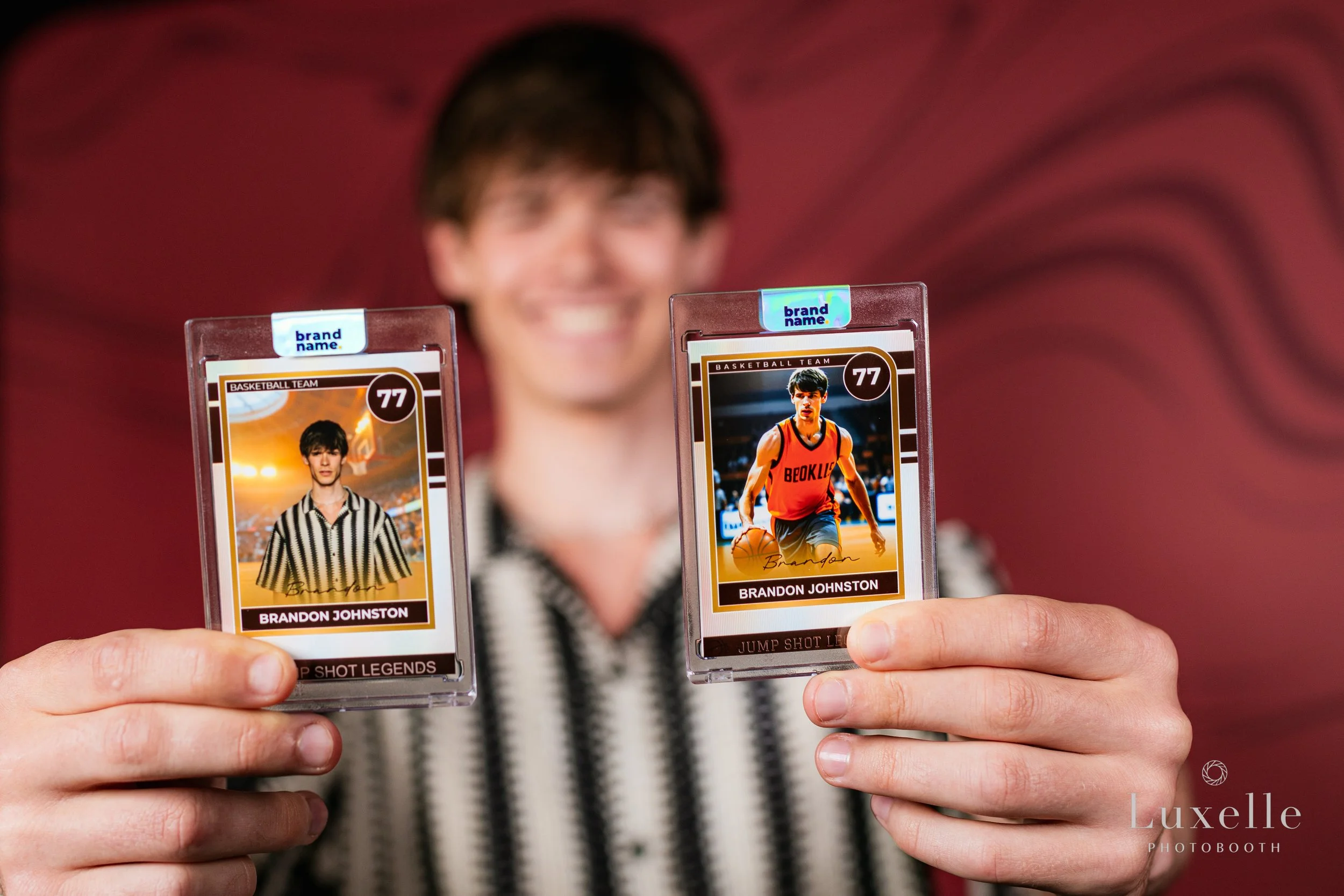 Guest holding custom sports trading card prints from a Luxelle photo activation at a sports event in Southern California